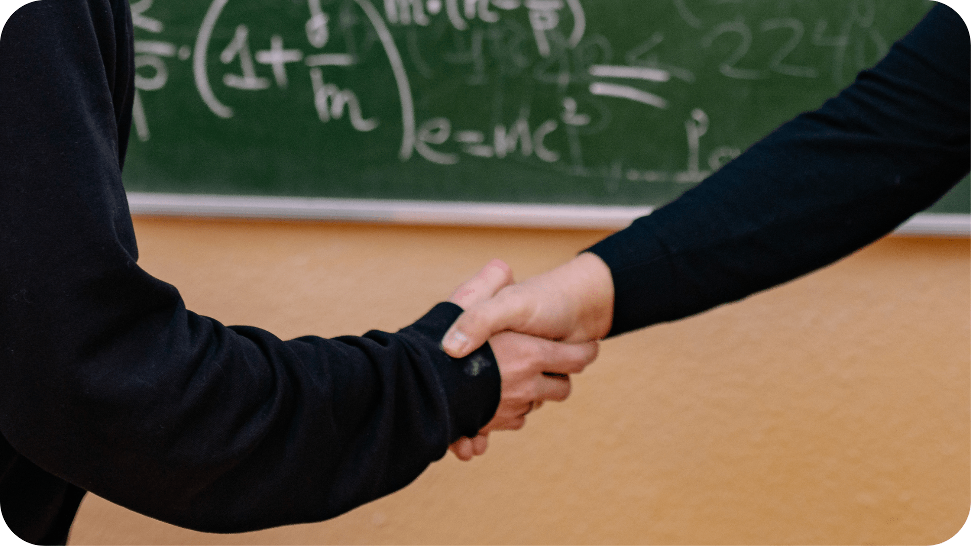 Teachers shaking hands